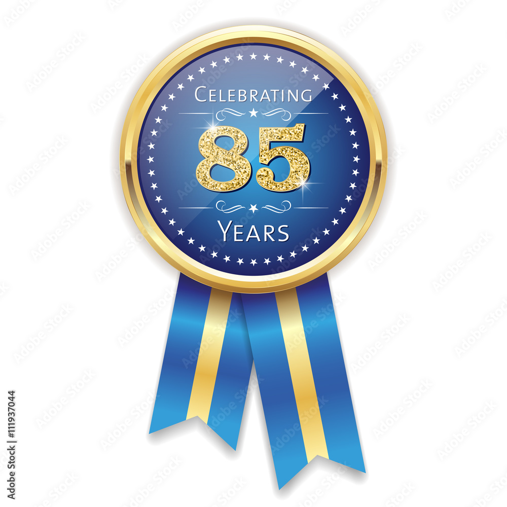 Fototapeta premium Blue celebrating 85 years badge, rosette with gold border and ribbon