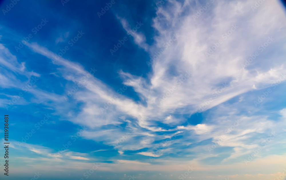 .white fluffy clouds in the blue sky .white fluffy clouds in the blue sky