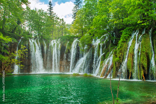  Beautiful landscape, waterfall and clear green water in the Plitvice Lakes National Park in Croatia 