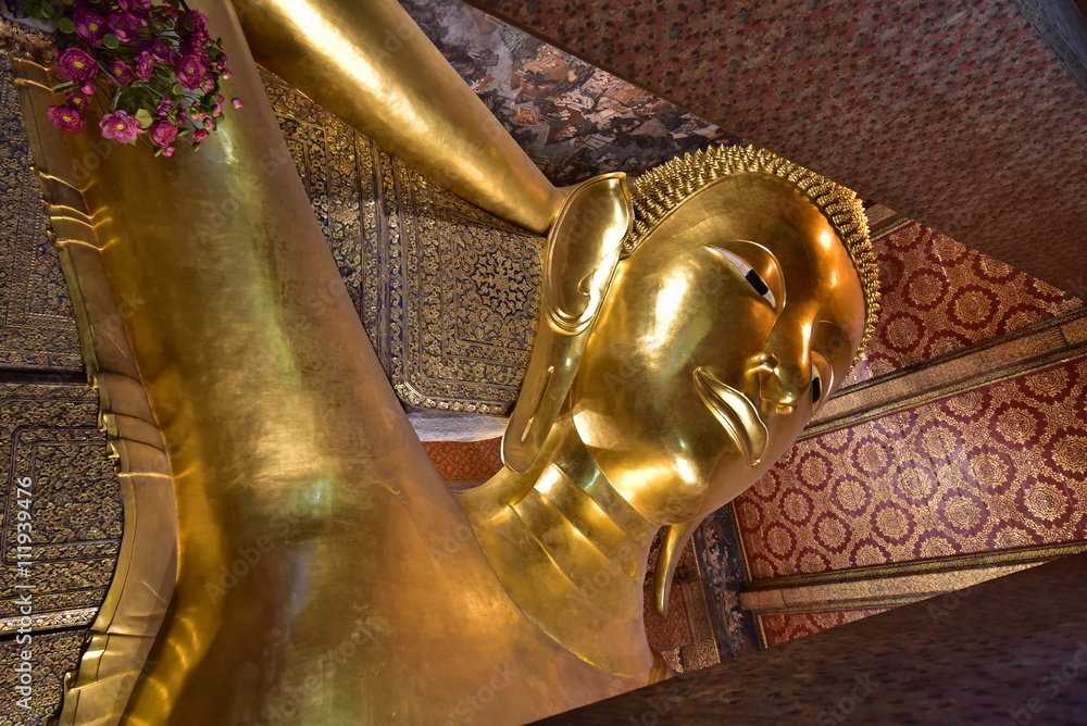 Wat Pho, one of the oldest and largest Buddhist temples in Bangkok is known as 'The Temple of the Reclining Buddha' thanks to the 15 meter high, 43 meter long Buddha image it shelters