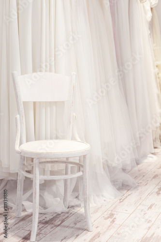 Slika na platnu Wonderful assortment of bridal gowns in shop