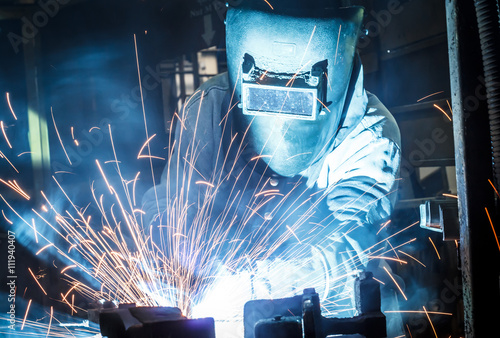 Photos Industrial steel welder in factory