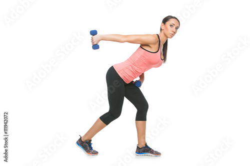 Sporty woman with dumbbells © svetography