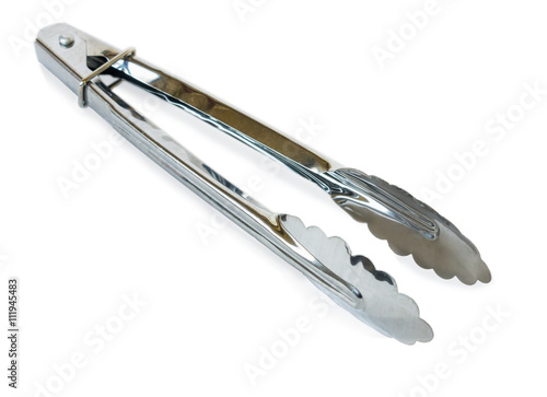 Kitchen tongs stainless steel on white background photo
