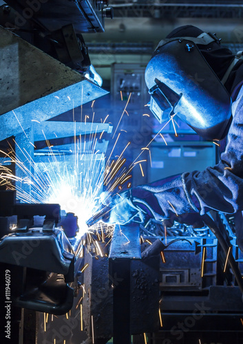Fényképezés Industrial steel worker speeds motion in factory
