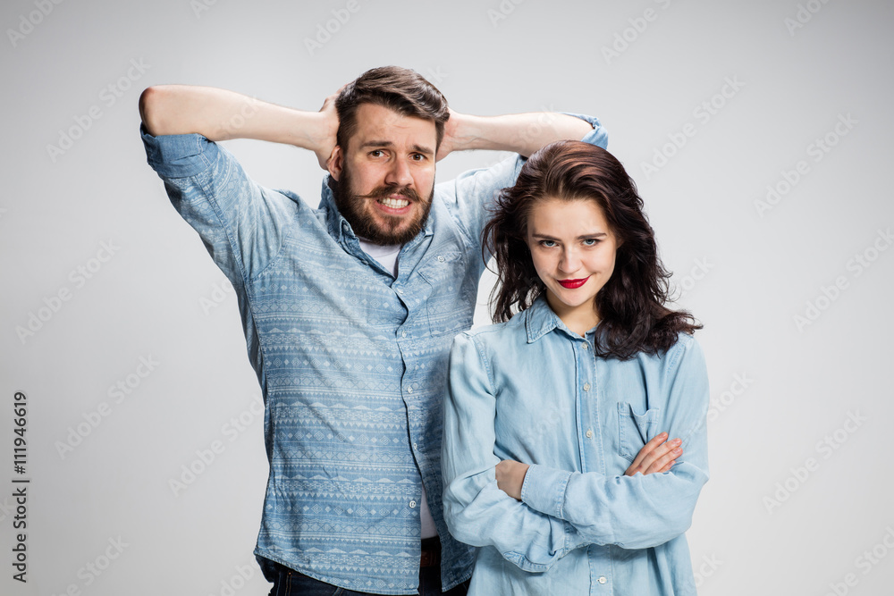 The young couple with different emotions during conflict The young couple with different emotions during conflict