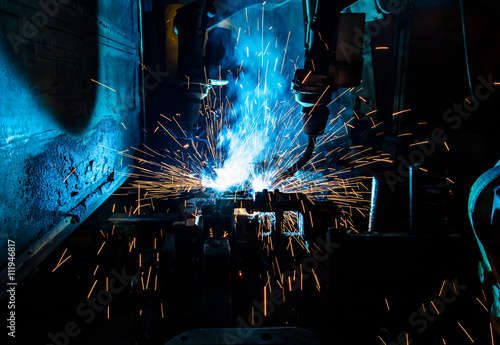 Welding robots movement in a car factory