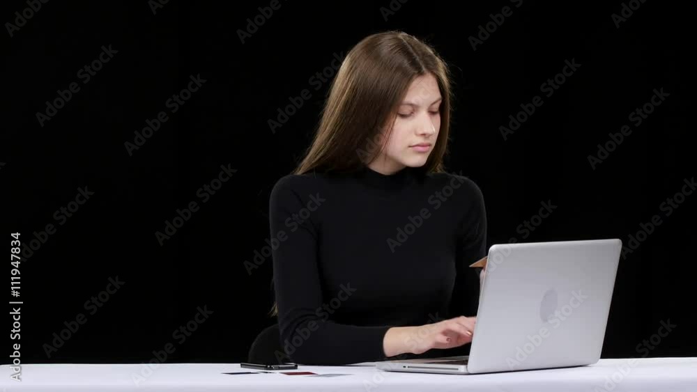 Girl orders a product online and immediately receives it. Black Girl orders a product online and immediately receives it. Black