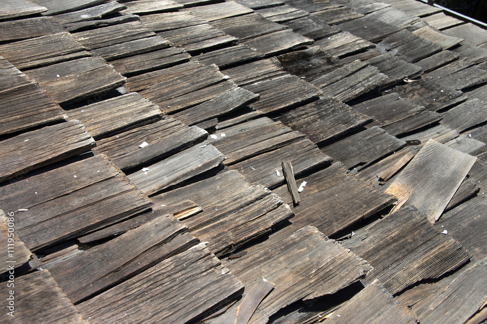 Wood shake shingle roof more then 30 years old decaying and falling