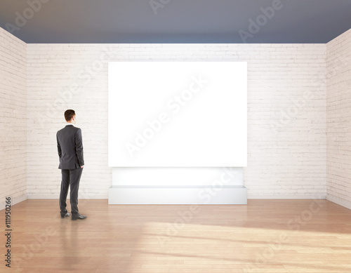 Man looking at whiteboard