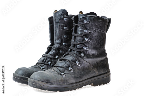 Pair of old military shoes/Pair of black leather army shoes on a white background