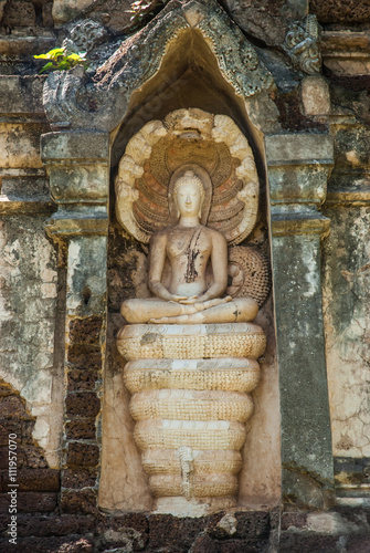 Buddha image with overspread king of naga