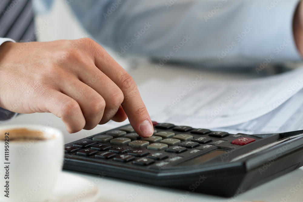 Close up view of bookkeeper or financial inspector hands making Close up view of bookkeeper or financial inspector hands making