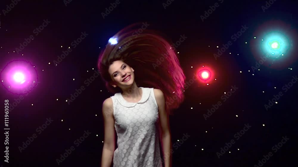 Brunette girl making head movements. Slow motion Brunette girl making head movements. Slow motion