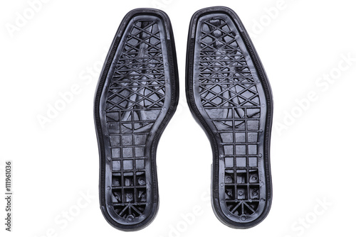 Black shoe soles/Pair of black men's shoes soles on white background
