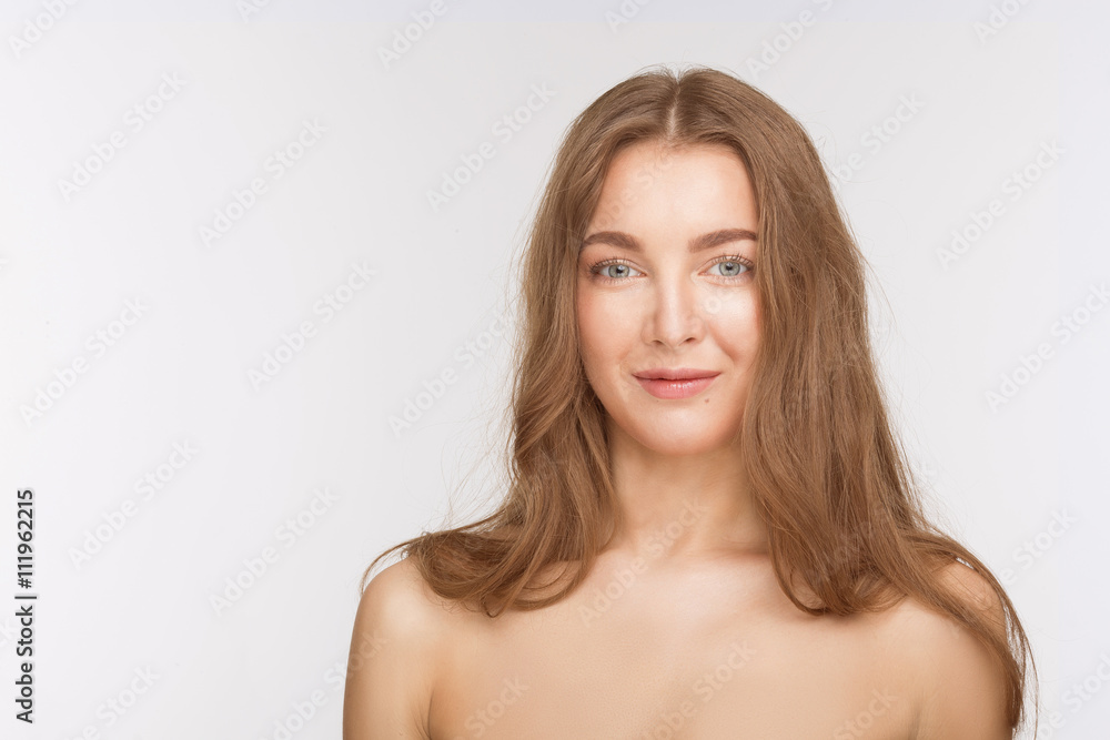 Portrait of happy beautiful shirtless lady posing for photographer over white background. Woman with brown hair looking at camera. Portrait of happy beautiful shirtless lady posing for photographer over white background. Woman with brown hair looking at camera.