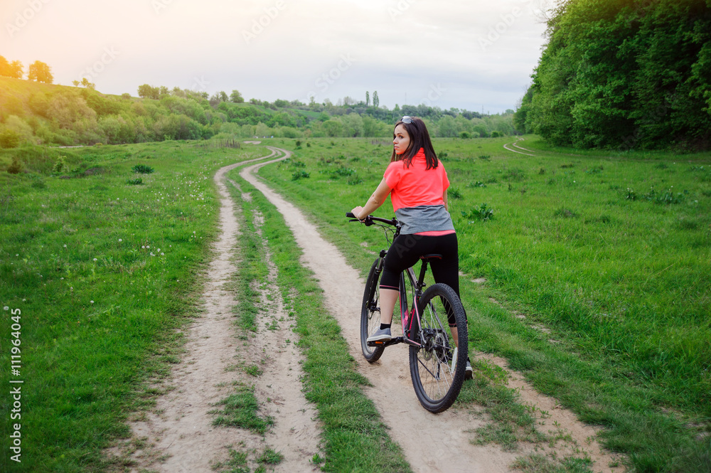 A girl riding a bike