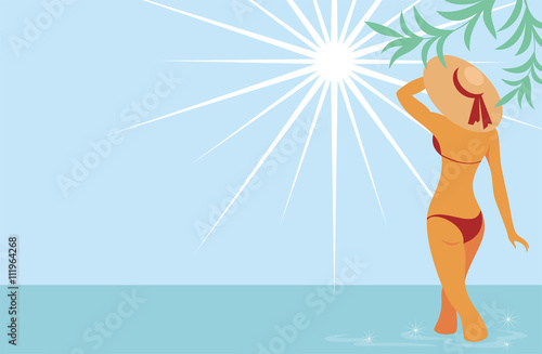 beautiful tanned lady in a hat standing in the sea looking at the sun. Background