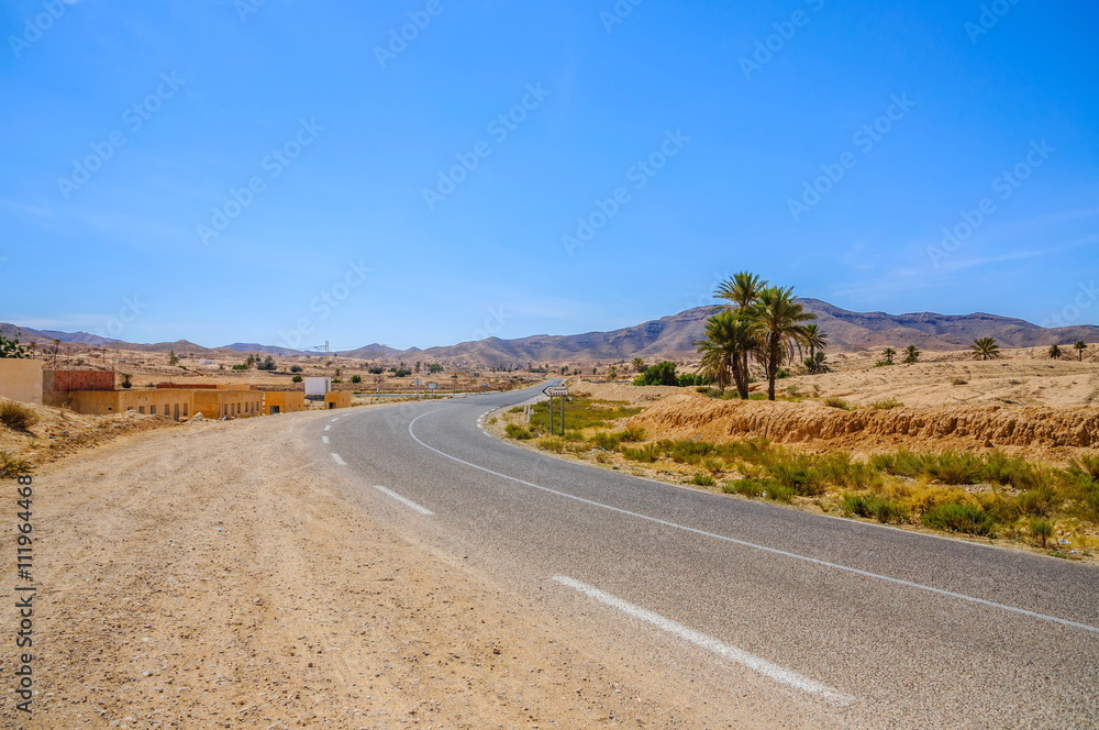Road in Sahara desert, Tunisia, Africa Road in Sahara desert, Tunisia, Africa