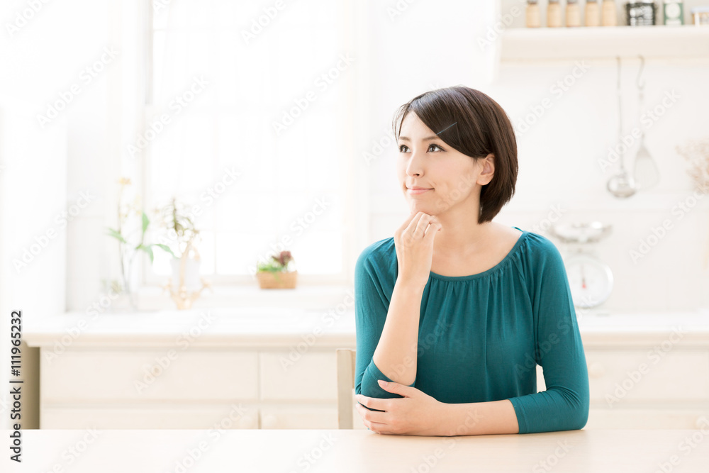 young asian woman in the kitchen