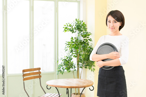 portrait of asian waitress in the cafe