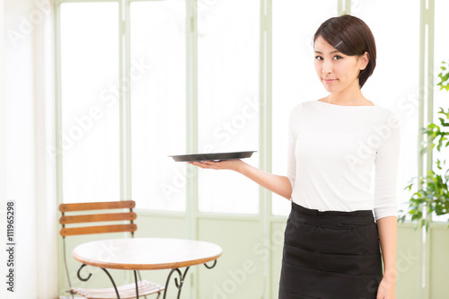 portrait of asian waitress in the cafe