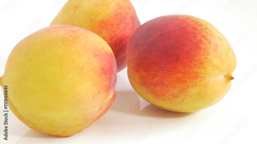 Peaches on white juicy fruit close-up UHD 4k 2160p footage - Peach on white background 3840X2160 UHD video Peaches on white juicy fruit close-up UHD 4k 2160p footage - Peach on white background 3840X2160 UHD video