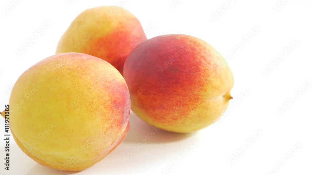 Peach juicy fruit close up UHD 4k 2160p footage panning on white background - Peach on white background 3840X2160 UHD fruit video 2 Peach juicy fruit close up UHD 4k 2160p footage panning on white background - Peach on white background 3840X2160 UHD fruit video 2