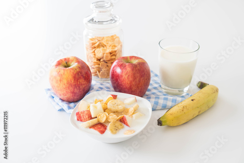 Fototapeta Naklejka Na Ścianę i Meble -  milk, apple, banana and cornflakes