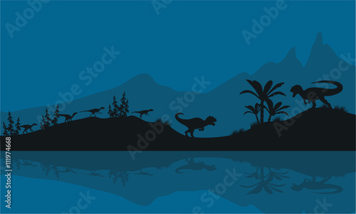 Silhouette of Allosaurus in riverbank