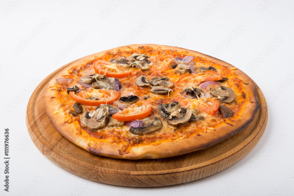 Whole pizza on white background