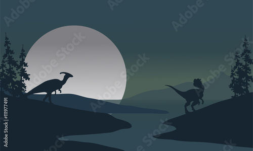 Fotografia Silhouette of Dilophosaurus and Parasaurolophus