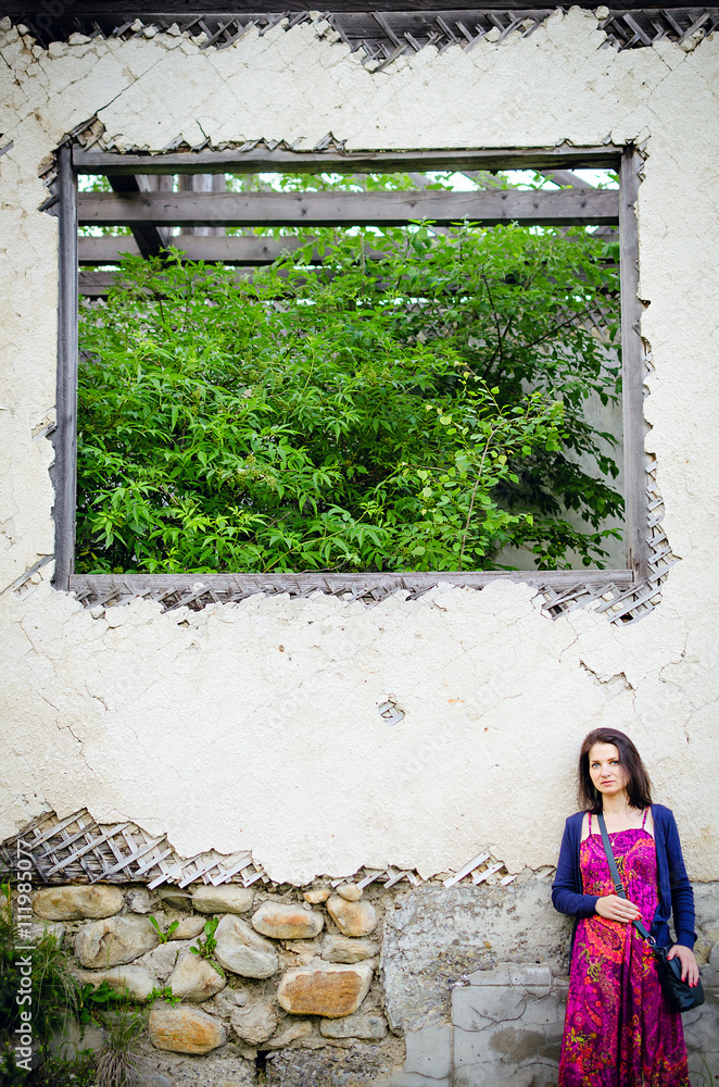 woman at the grunge window