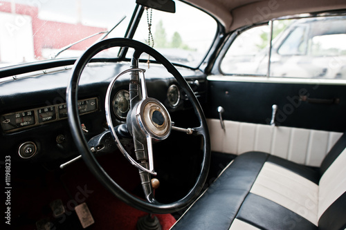 Dashboard and steering wheel of classic car © AS Photo Family