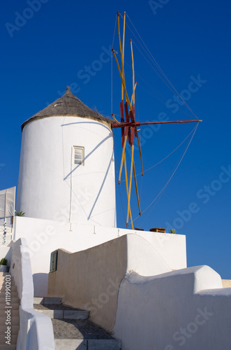 Famous windmill in Oia town, Santorini, Greece