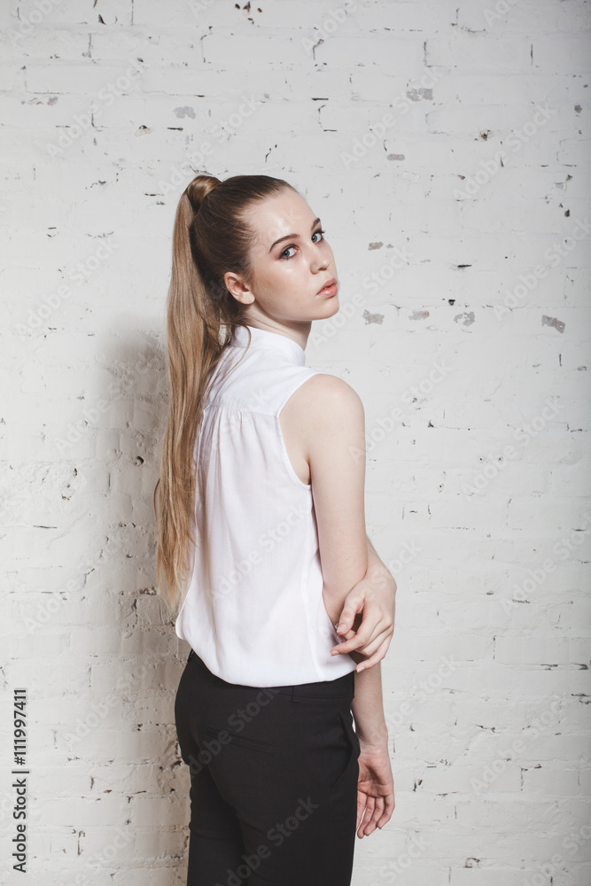 full-length fashion girl posing on white background.Portrait of full-length fashion girl posing on white background.Portrait of