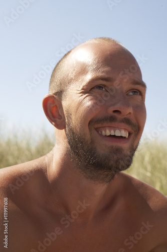 Laughing mid adult man, Vastkusten, Sweden photo