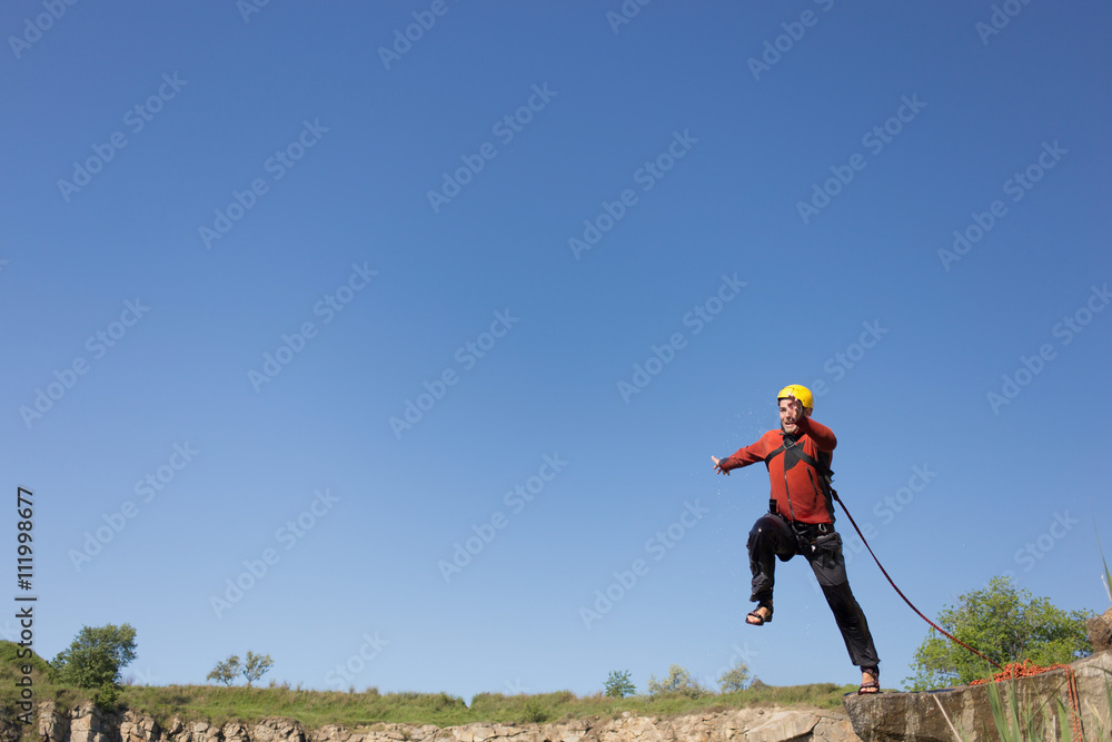 Jump off the cliff with a rope.