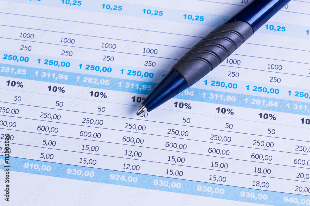 Business performance graph with ballpoint pen Business performance graph with ballpoint pen