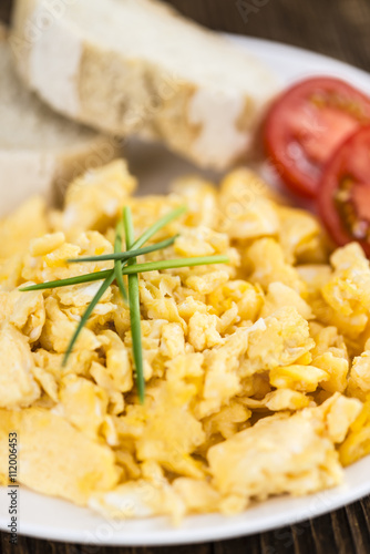 Plate with scrambled Eggs (close-up shot)