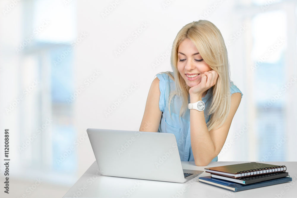 Casual woman using laptop Casual woman using laptop