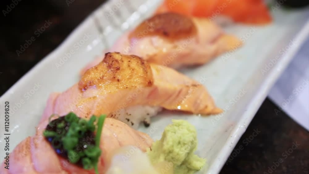 Japanese food set assorted salmon nigiri sushi set, aburi, miso, fish roe and maki Japanese food set assorted salmon nigiri sushi set, aburi, miso, fish roe and maki
