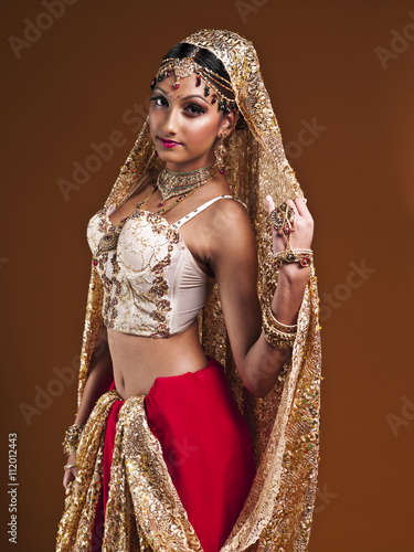 beautiful young indian bride looking at camera.