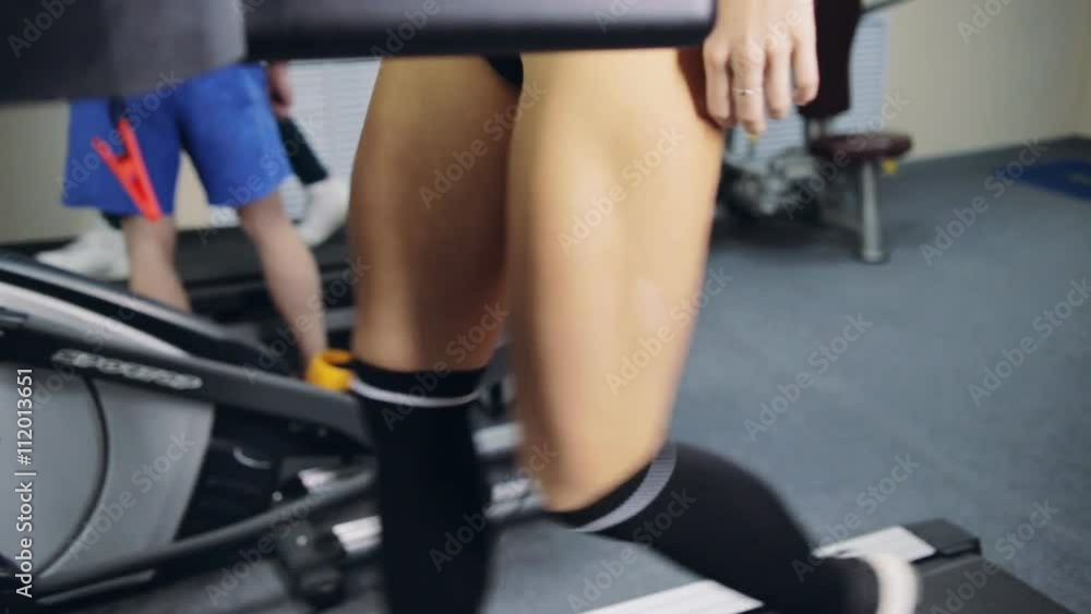Young fit beautiful girl in gym. Graded Young fit beautiful girl in gym. Graded