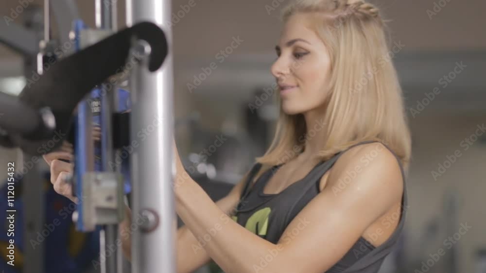 Young fit beautiful girl in gym. Ungraded Young fit beautiful girl in gym. Ungraded