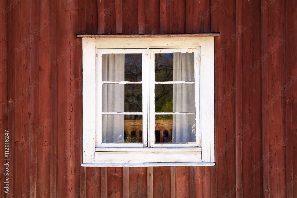 Old wooden wall with window in white frame Old wooden wall with window in white frame