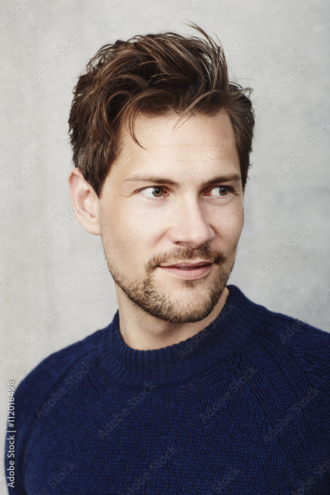 Smiling guy in blue sweater Smiling guy in blue sweater