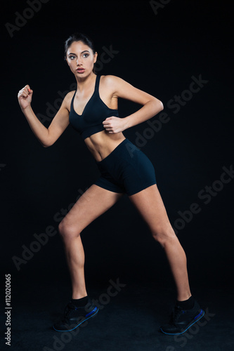 Full length portrait of a fitness woman