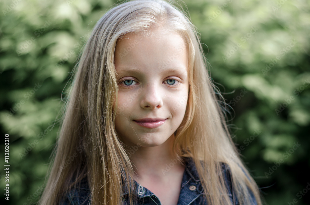 Portrait of a beautiful blonde little girl with long hair Portrait of a beautiful blonde little girl with long hair