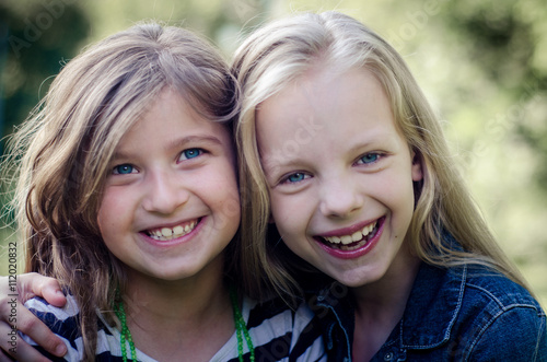 Close up of face of happy children while laughing.